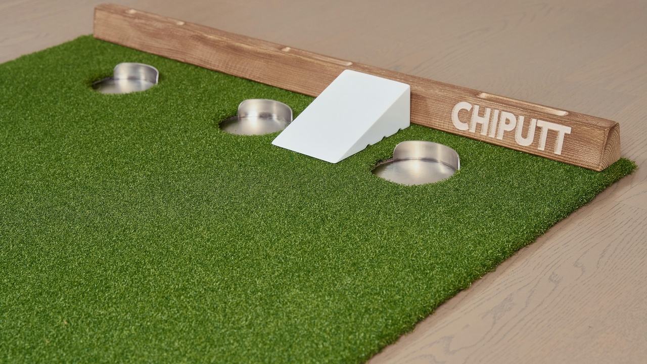 Chinchilla dust bath and habitat setup with hay and hiding box