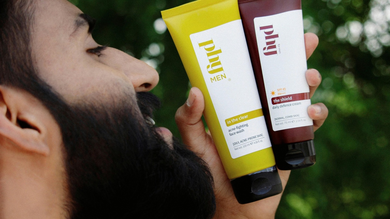 Juvenile bearded dragon eating insects and vegetables