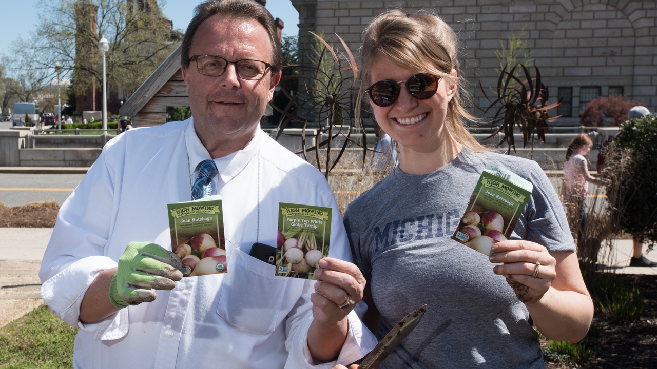 Community habitat garden with children learning about plants and wildlife
