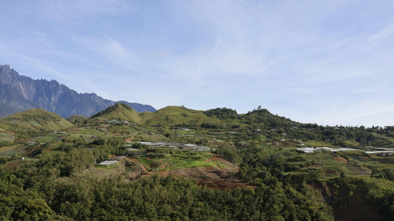 Traditional terraced landscape with villagers and pathways, illustrating cultural landscape and tourism potential
