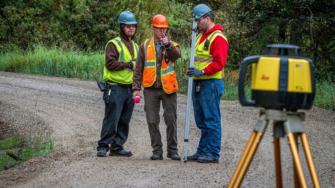 Local people and anacondas: guide showing an anaconda in a wetland setting