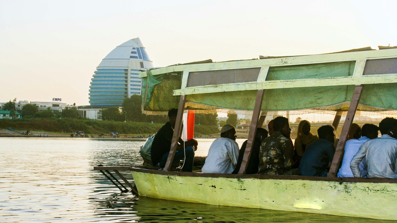 Elephants and giraffes in Sudan's savanna near Dinder National Park
