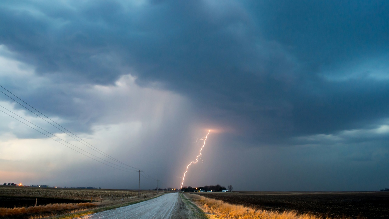 Urban skyline under summer heatwave with CO2 monitoring station nearby