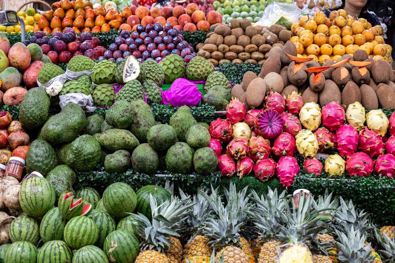 Vibrant array of exotic and tropical fruits in a Mexican market, showcasing local produce.