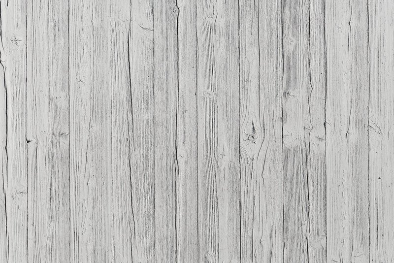 Texture of weathered white wooden planks for background or copyspace.