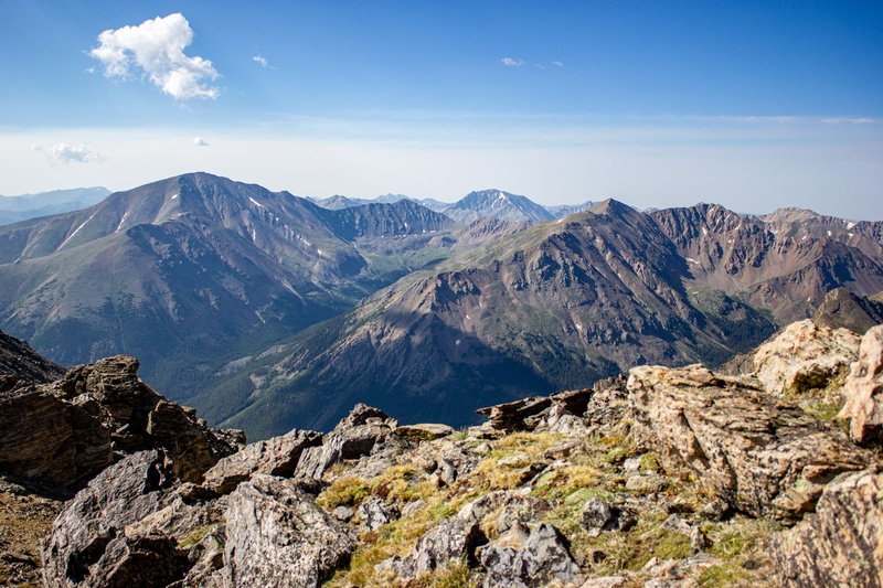 Stunning view of the Colorado Rocky Mountains under a clear blue sky.